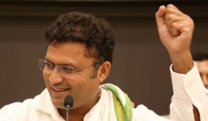 Ashok Tanwar addressing a public rally, representing his political vision.